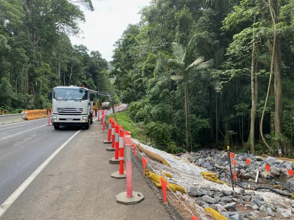 VACIT truck working inside a controlled roadside work zone