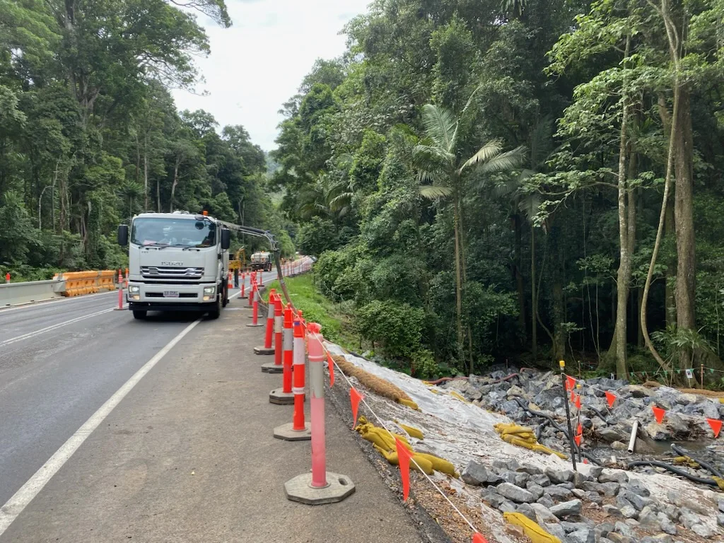 VACIT truck working inside a controlled roadside work zone